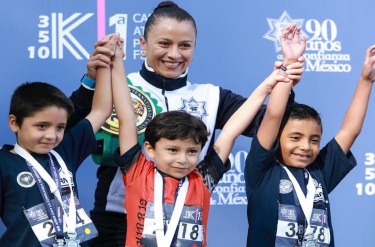 Federal Police Race 2018 — young athletes celebrating on podium