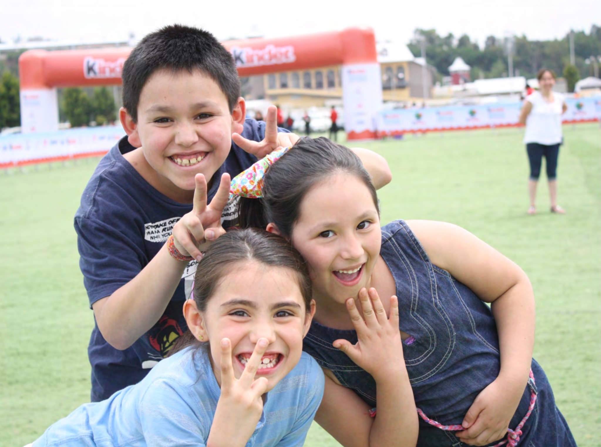 Kinder Run — niños sonriendo en el evento Kinder